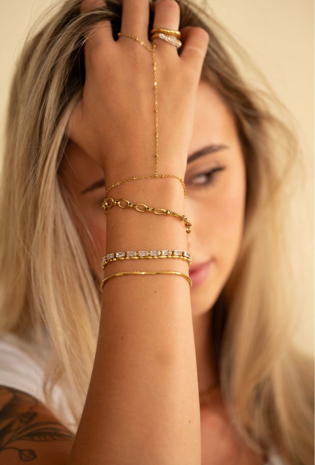 Signature Chain Bracelet Stack worn on wrist with ring and bracelet chain